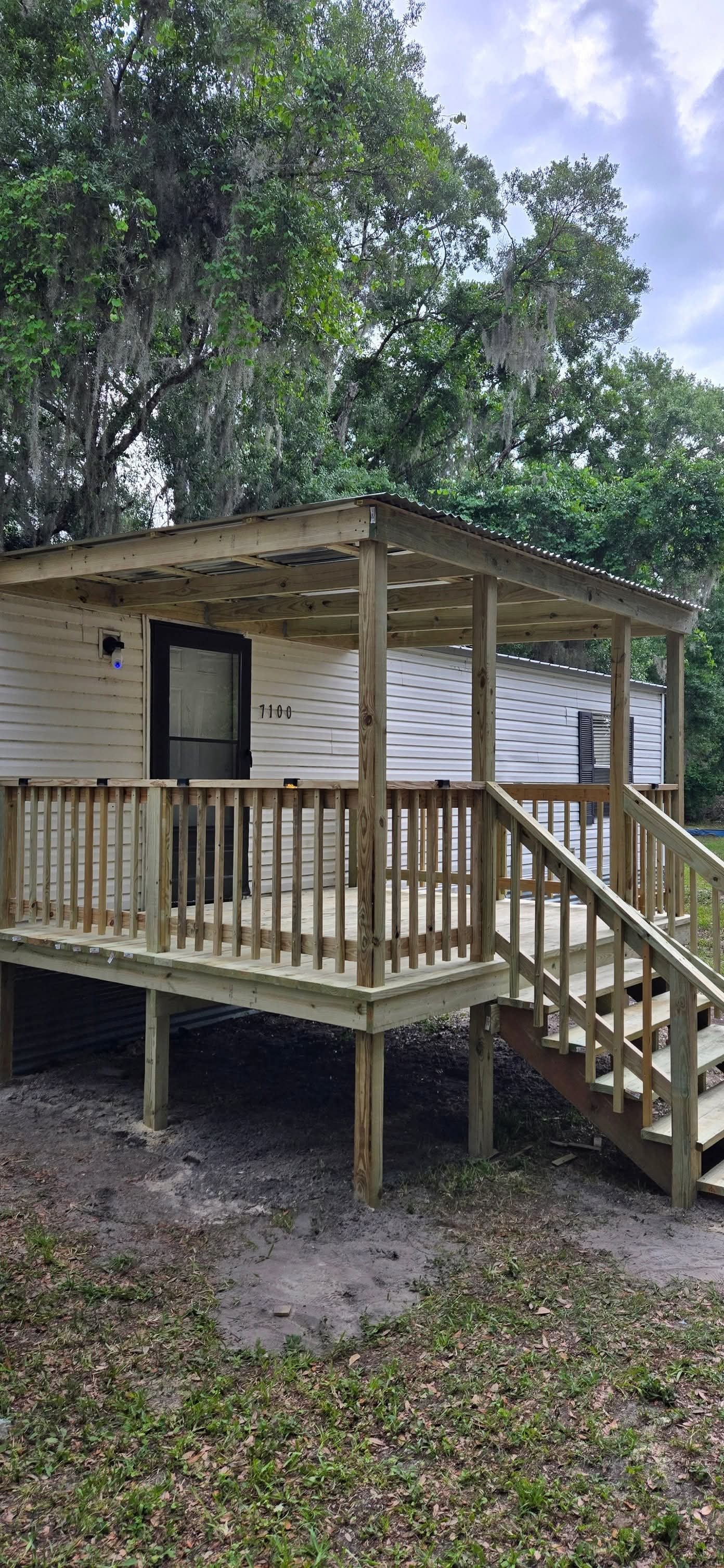 New wood deck and covered porch construction